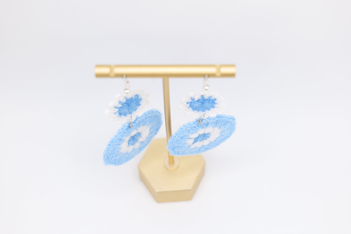 Two-flower crocheted earrings in light blue image 1