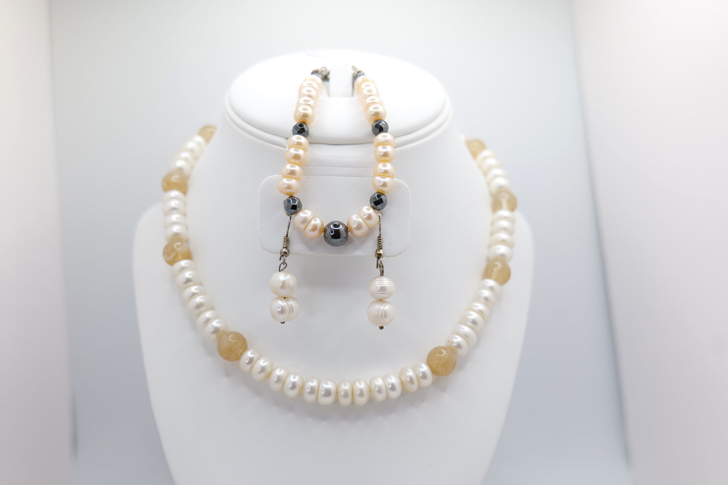 Pearl necklace, earrings, and bracelet set with citrine and hematite accents image 0
