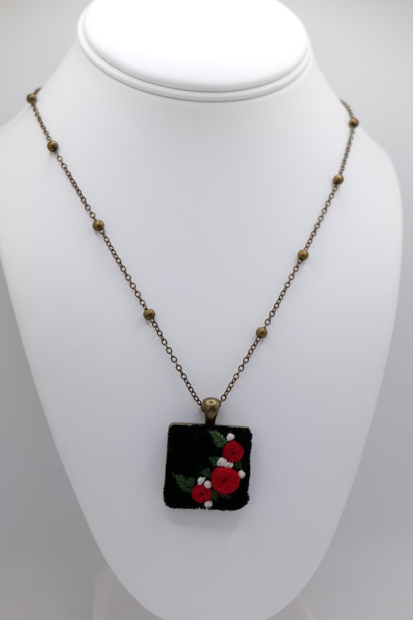 Floral Embroidery Pendant with Bronze