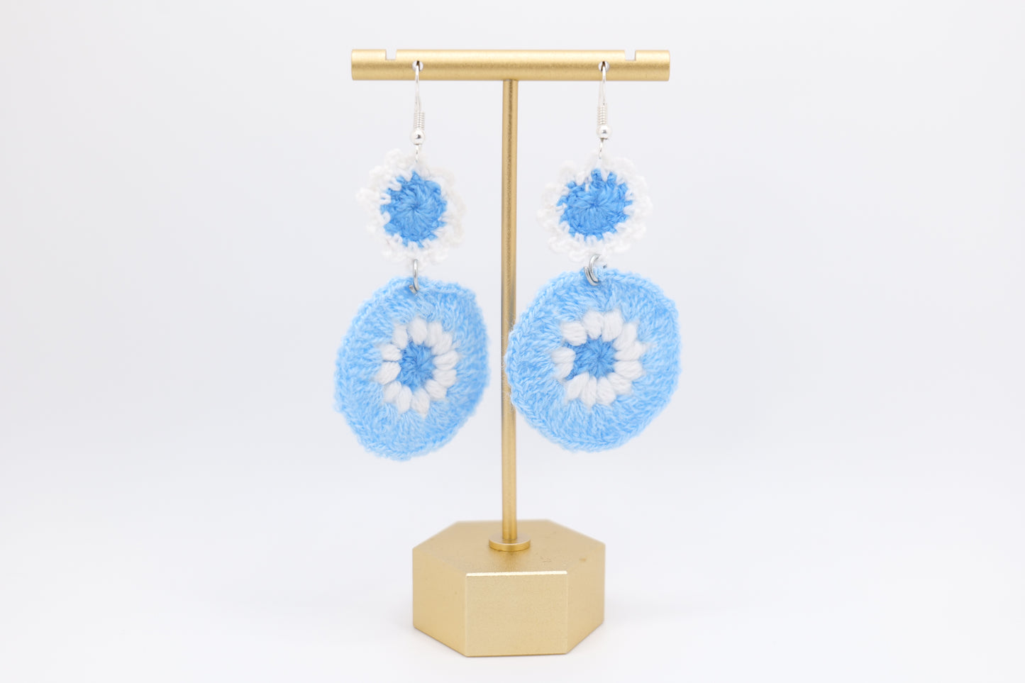 Two-flower crocheted earrings in light blue image 0