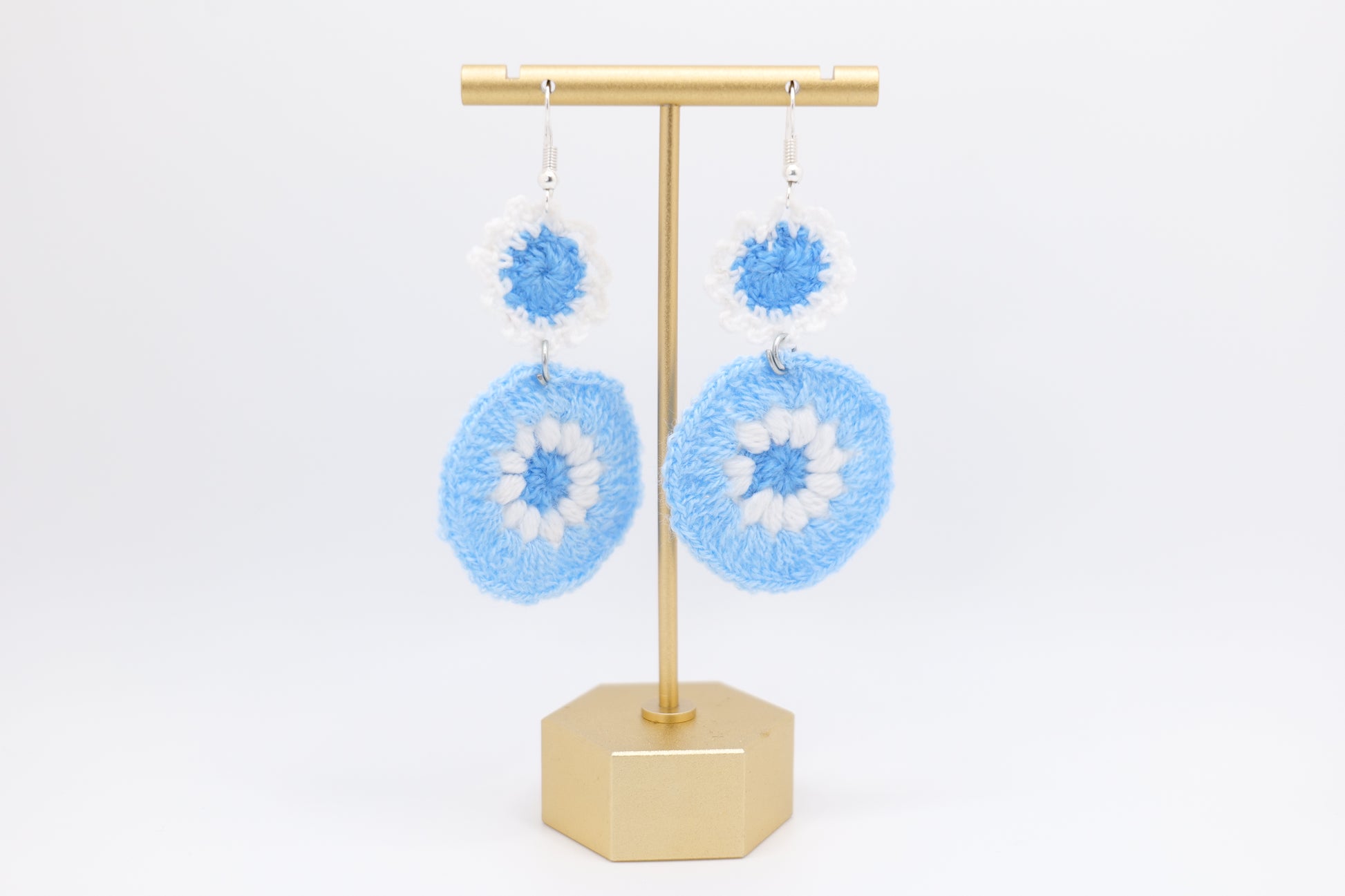 Two-flower crocheted earrings in light blue image 0